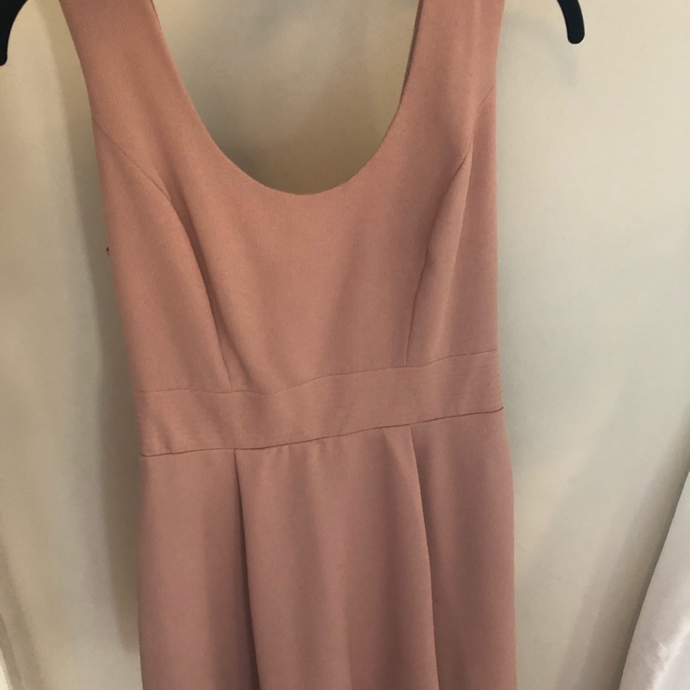 Dress with low back and bow